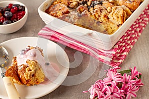 Leftovers bread pudding with nuts and berries