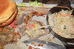 Leftovers from a gourmet burger meal