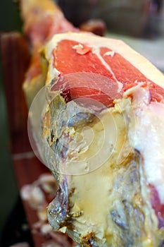 Leg jamon serrano prepared for slicing, traditional Spanish ham