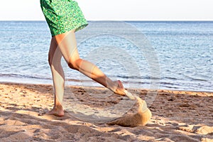 Leg of woman running on sand beach. summer vacation. Happy beautiful woman running on the beach