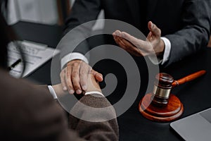 Legal advisers encourage clients. Justice and lawyer concept in the office