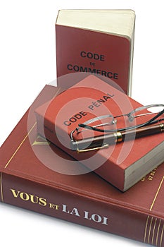 Legal books and the French penal and trade code photo