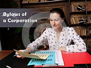 Legal concept about Bylaws of a Corporation . Closeup portrait of unrecognizable successful Businesswoman wearing formal suit photo