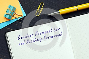 Legal concept about Civilian Criminal Law and Military Personnel with sign on the page