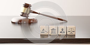 Legal Concept: judge's gavel hammer as a symbol of law and order and wooden cubes with icon