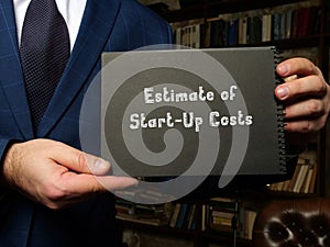 Legal concept meaning Estimate of Start-Up Costs with sign on the piece of paper