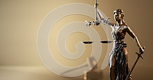 Legal Concept: Themis is the goddess of justice and the judge& x27;s gavel hammer as a symbol of law and order