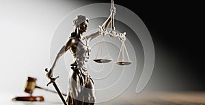 Legal Concept: Themis is the goddess of justice and the judge's gavel hammer as a symbol of law and order