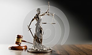 Legal Concept: Themis is the goddess of justice and the judge's gavel hammer as a symbol of law and order