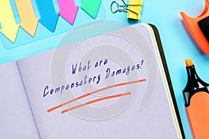 Legal concept about What are Compensatory Damages? with sign on the piece of paper