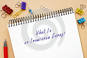 Legal concept about What Is an Insurance Copay? with phrase on the piece of paper photo