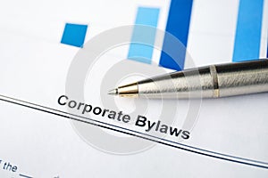 Legal document Corporate Bylaws on paper with pen