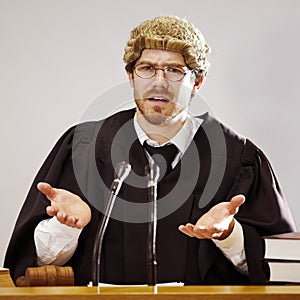 Legal, doubt and a judge man in court asking a question about trial evidence for a crime verdict. Law, justice and