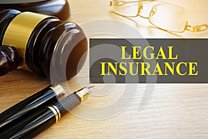 Legal insurance concept. Gavel on a table.