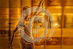 Legal law concept image, Scales of Justice, golden light.