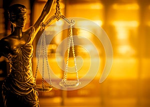 Legal law concept image, Scales of Justice, golden light.