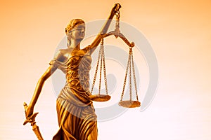Legal law concept image, Scales of Justice, golden light.