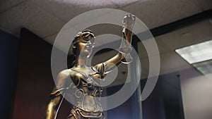 Legal and law concept statue of Lady Justice on background. Move camera view