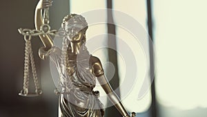 Legal and law concept statue of Lady Justice on  blurred background