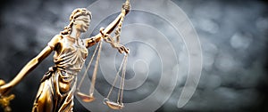 Legal and law concept statue of Lady Justice with scales of justice photo