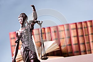 Legal Law and Justice concept - Open law book with a wooden judges gavel on table in a courtroom or law enforcement office. Copy