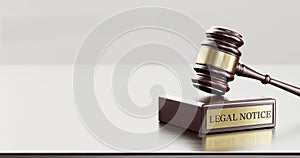 Legal Notice: Judge's Gavel and wooden stand with text word