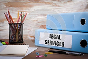 Legal Services, Office Binder on Wooden Desk. On the table color