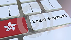 Legal Support text and flag of Hong Kong on the computer keyboard. Online legal service related 3D animation