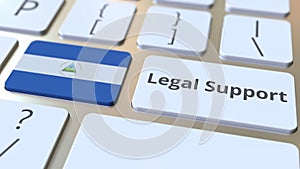 Legal Support text and flag of Nicaragua on the computer keyboard. Online legal service related 3D rendering