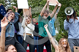 Legalize marijuana. manifestation. young adults holding banners and placards outdoors