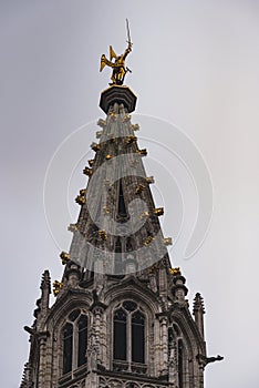 Legend, myth and religion: Archangel Michael, patron saint of Brussels, slaying a Dragon on the city hall