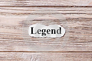 Legend of the word on paper. concept. Words of legend on a wooden background