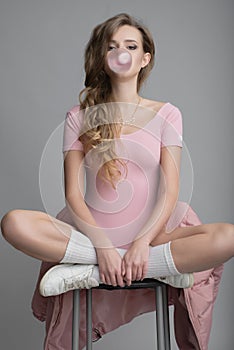 Leggy attractive model on grey background photo
