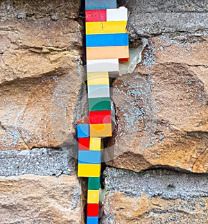 Lego filling a gap in bricks.