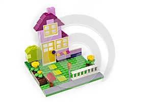 Lego house made of classic colored building blocks