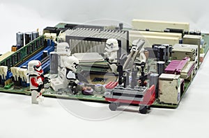 Lego starwars character assembling cpu on motherboard