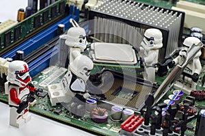 Lego starwars character assembling cpu on motherboard