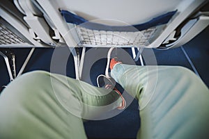 Legroom between seats in airplane