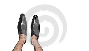 Legs of an adult man in model shoes