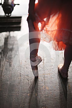 Legs of a ballerina in pointe shoes