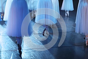 Legs of ballet dancers corps de ballet in pointe shoes