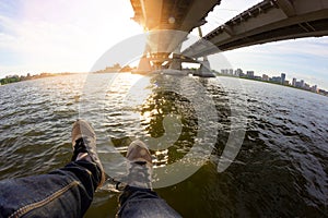 Legs on the bridge edge