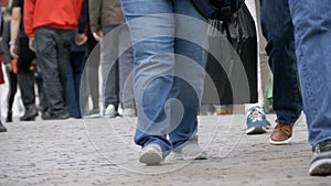 Legs of Crowd People Walking on the Street in Slow Motion