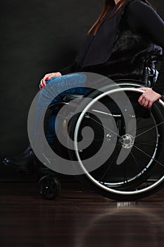 Legs of disabled person.