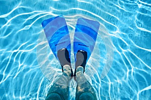 Legs in flippers underwater