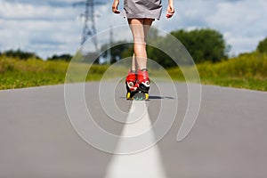 Legs of girl having roller skate exercise