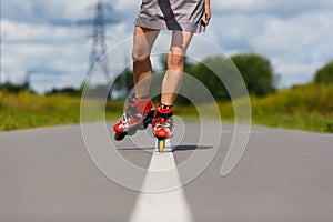 Legs of girl having roller skate exercise