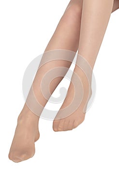 Legs of a girl in transparent tights isolated on a white background