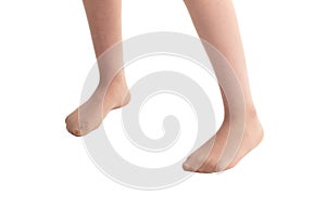 Legs of a girl in transparent tights isolated on a white background