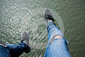 Legs over water photo
